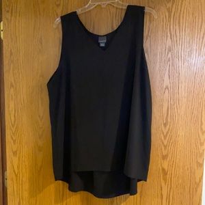 Covington brand size xl black flowy top with pleated back design.